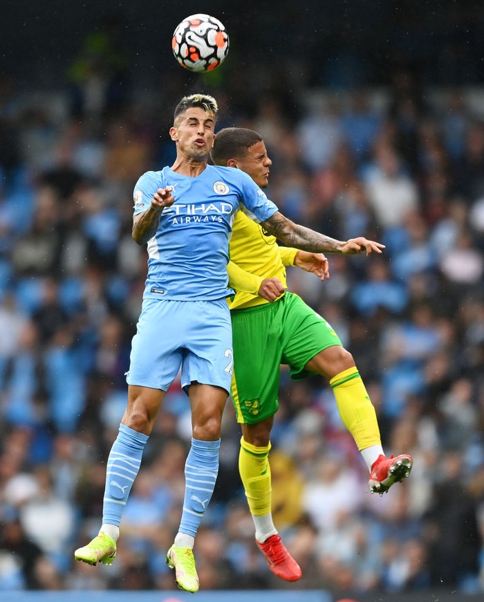 MANCHESTER, ENGLAND - AUGUST 21:  Joao Cancelo of Manchester City controls the ball during the Premier League match between Manchester City  and  Norwich City at Etihad Stadium on August 21, 2021 in Manchester, England. (Photo by Shaun Botterill/Getty Images )
