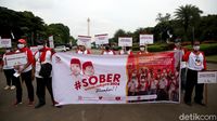 Potret Relawan Jokpro Gelar Aksi di Patung Kuda