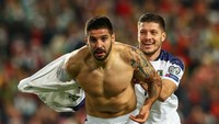 Timnas Serbia lolos ke putaran final Piala Dunia 2022 setelah mengalahkan Portugal 2-1 dalam laga pemungkas Grup A kualifikasi zona Eropa. Serbia membukukan kemenangan mereka secara dramatis sebab sempat tertinggal lebih dulu. Getty Images/Carlos Rodrigues.