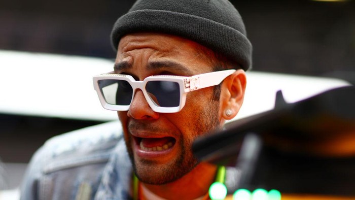 BARCELONA, SPAIN - MAY 12: Brazilian football superstar Dani Alves looks on in the Red Bull Racing garage before the F1 Grand Prix of Spain at Circuit de Barcelona-Catalunya on May 12, 2019 in Barcelona, Spain. (Photo by Dan Istitene/Getty Images)