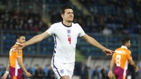 Pesta gol Inggris dimulai di menit keenam. Harry Maguire dengan mudah menanduk bola hasil sepakan penjuru Phil Foden untuk disarangkan ke gawang San Marino. Skor 1-0 untuk Inggris. AP Photo/Antonio Calanni.