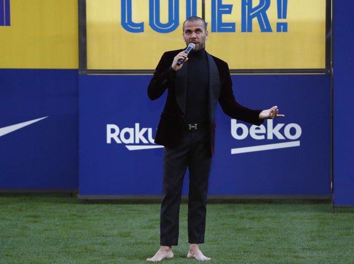Dani Alves speaks during his official presentation for FC Barcelona in Barcelona, Spain, Wednesday, Nov. 17, 2021. Veteran full back Dani Alves has returned to Barcelona at age 38 to finish out the rest of the season with the team. Alves formed part of Barcelonas greatest era from 2008 to 2016 and helped it win 23 titles, including three Champions League trophies and six Spanish leagues.(AP Photo/Joan Monfort)
