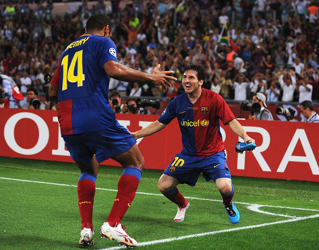 ROME - MAY 27:  Lionel Messi of Barcelona celebrates with his team mate Thierry Henry after Messi scored the second goal for Barcelona during the UEFA Champions League Final match between Barcelona and Manchester United at the Stadio Olimpico on May 27, 2009 in Rome, Italy.  (Photo by Jasper Juinen/Getty Images)