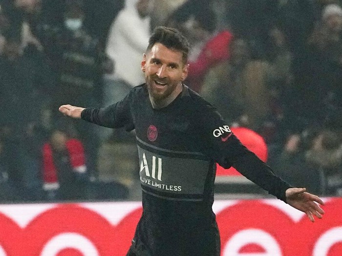 PSG's Lionel Messi celebrates after scoring his side's third goal during French League One soccer match between Paris Saint-Germain and Nantes at the Parc des Princes stadium in Paris, France, Saturday, Nov. 20, 2021. (AP Photo/Michel Euler)