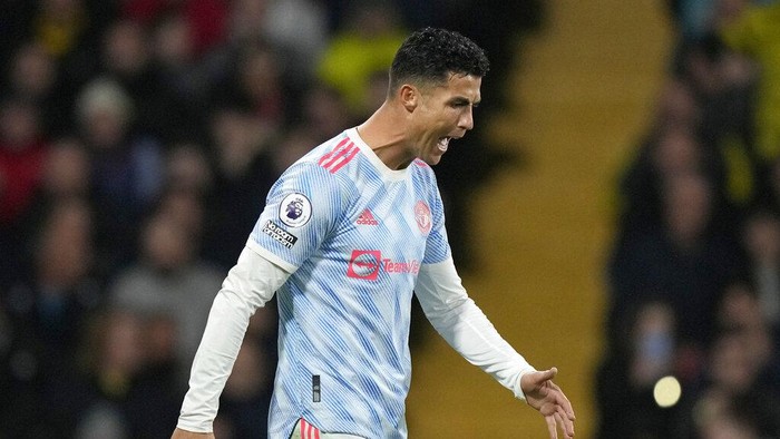Manchester Uniteds Cristiano Ronaldo reacts after scores a disallowed goal during the English Premier League soccer match between Watford and Manchester United at Vicarage Road, Watford, England, Saturday, Nov. 20, 2021. (AP Photo/Frank Augstein)