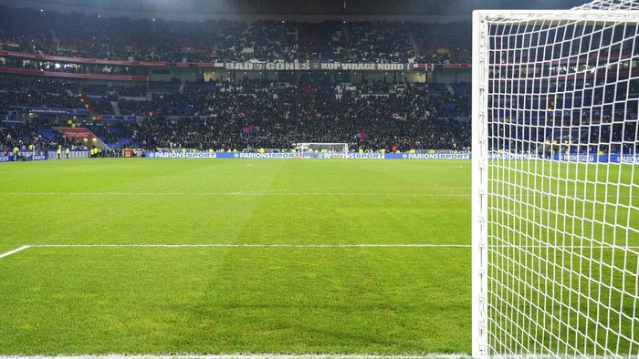 View of the empty field as players left after Marseille's Dimitri Payet was injured by an object thrown by a Lyon supporter during the French League One soccer match between Lyon and Marseille, in Decines, near Lyon, central France, Sunday, Nov. 21, 2021. (AP Photo/Laurent Cipriani)