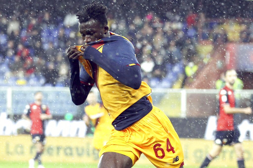 Roma's Felix Afena-Gyan (64) celebrates after scoring against Genoa in an Italian Serie A soccer match at the Luigi Ferraris Stadium in Genoa, Italy, Sunday, Nov. 21, 2021. (Tano Pecoraro/LaPresse via AP)