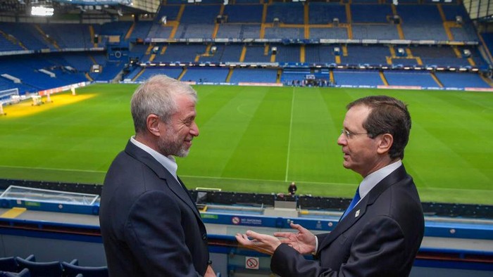 In this photo, released by the Israel’s Government Press Office, Chelsea owner Roman Abramovich, left, talks with Israeli President Isaac Herzog at Stamford Bridge, in London, Sunday, Nov. 21, 2021. Chelsea owner Roman Abramovich hosted Israeli President Isaac Herzog at Stamford Bridge on Sunday as part of the Premier League clubs campaign against antisemitism. The small event, attended by about 50 people, was the first time Abramovich has been seen at Chelseas stadium since 2018 when he withdrew his application for a British visa renewal. (Kobi Gideon/Israel’s Government Press Office via AP)