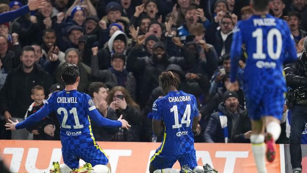 Chelsea's Trevoh Chalobah, center, celebrates after scoring his side's opening goal during the Champions League group H soccer match between Chelsea and Juventus at Stamford Bridge stadium in London, Tuesday, Nov. 23, 2021. (AP Photo/Matt Dunham)