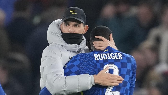 Chelseas head coach Thomas Tuchel, left, greets Chelseas Antonio Rudiger at the end of the Champions League group H soccer match between Chelsea and Juventus at Stamford Bridge stadium in London, Tuesday, Nov. 23, 2021. (AP Photo/Matt Dunham)