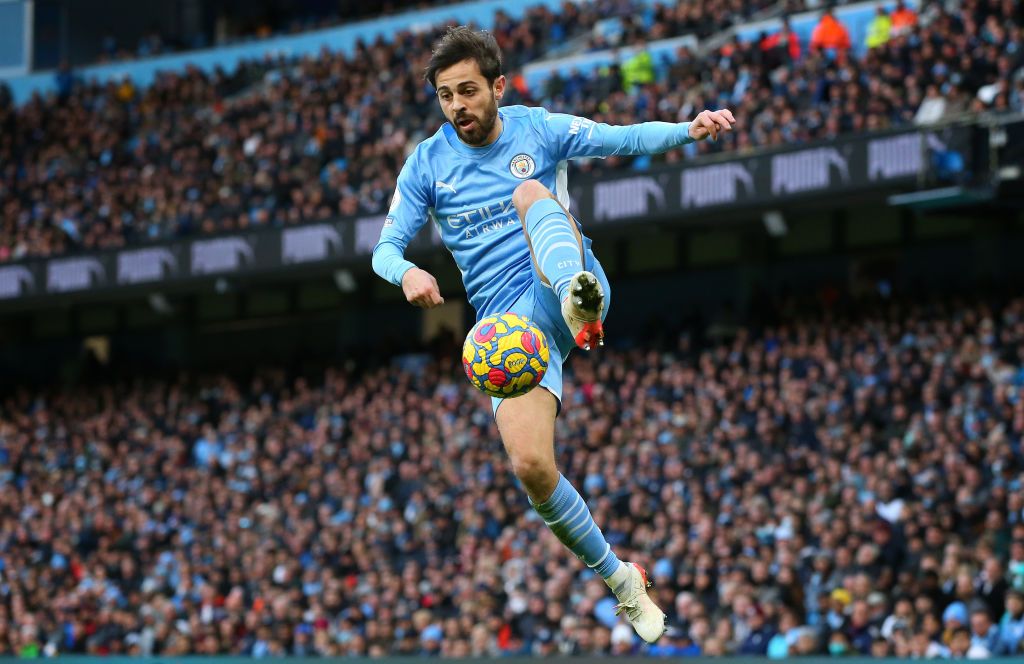 MANCHESTER, ENGLAND - NOVEMBER 21: Bernardo Silva of Manchester City celebrates after scoring their side's third goal during the Premier League match between Manchester City and Everton at Etihad Stadium on November 21, 2021 in Manchester, England. (Photo by Laurence Griffiths/Getty Images)