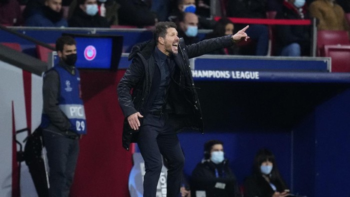 Atletico Madrids head coach Diego Simeone reacts during a Group B Champions League soccer match between Atletico Madrid and AC Milan at the Wanda Metropolitano stadium in Madrid, Spain, Wednesday, Nov. 24, 2021. (AP Photo/Manu Fernandez)