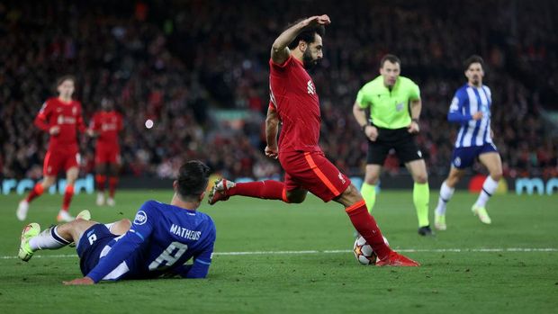 LIVERPOOL, ENGLAND - NOVEMBER 24: Mohamed Salah of Liverpool scores their side's second goal during the UEFA Champions League group B match between Liverpool FC and FC Porto at Anfield on November 24, 2021 in Liverpool, England. (Photo by Clive Brunskill/Getty Images)