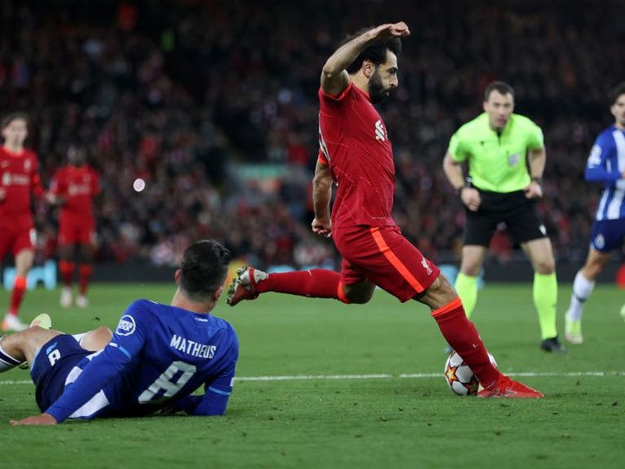 LIVERPOOL, ENGLAND - NOVEMBER 24: Mohamed Salah of Liverpool scores their side's second goal during the UEFA Champions League group B match between Liverpool FC and FC Porto at Anfield on November 24, 2021 in Liverpool, England. (Photo by Clive Brunskill/Getty Images)
