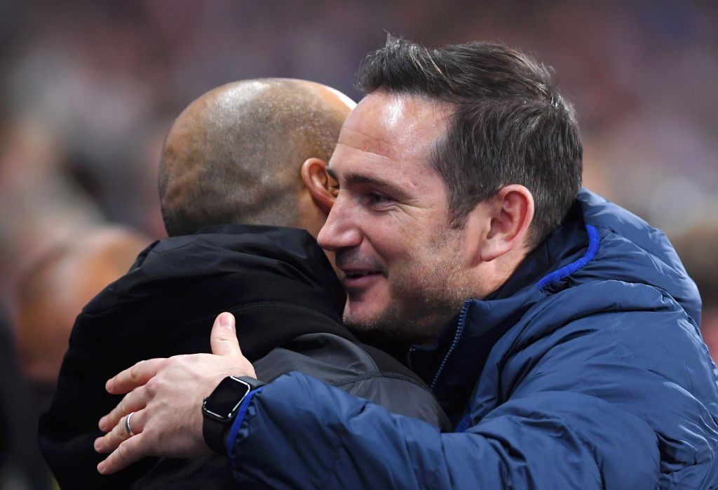MANCHESTER, ENGLAND - NOVEMBER 23: Pep Guardiola, Manager of Manchester City embraces Frank Lampard, Manager of Chelsea prior to the Premier League match between Manchester City and Chelsea FC at Etihad Stadium on November 23, 2019 in Manchester, United Kingdom. (Photo by Laurence Griffiths/Getty Images)