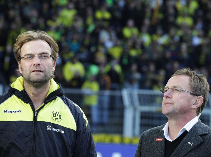 RESTRICTIONS / EMBARGO - ONLINE CLIENTS MAY USE UP TO SIX IMAGES DURING EACH MATCH WITHOUT THE AUTHORISATION OF THE DFL. NO MOBILE USE DURING THE MATCH AND FOR A FURTHER TWO HOURS AFTERWARDS IS PERMITTED WITHOUT THE AUTHORISATION OF THE DFL.
Dortmunds head coach Juergen Klopp (L) and Hoffenheims head coach Ralf Rangnick attend the German first division Bundesliga football Borrusia Dortmund vs 1899 Hoffenheim in the western German city of Dortmund on October 24, 2010. AFP PHOTO / BARTEK WRZESNIOWSKI (Photo by BARTEK WRZESNIOWSKI / AFP)
