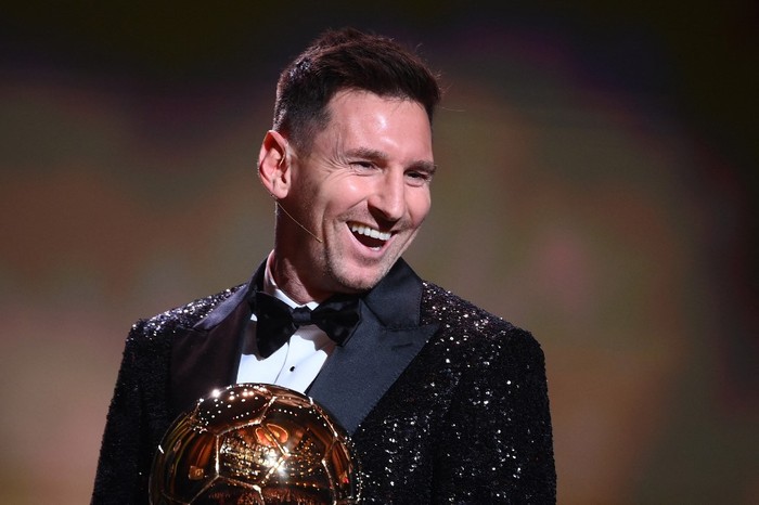 Messi Paris Saint-Germain's Argentine forward Lionel Messi reacts after being awarded the the Ballon d'Or award during the 2021 Ballon d'Or France Football award ceremony at the Theatre du Chatelet in Paris on November 29, 2021. (Photo by FRANCK FIFE / AFP)