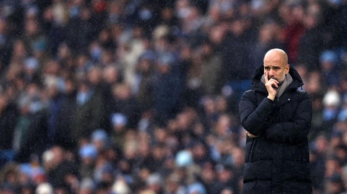 MANCHESTER, ENGLAND - NOVEMBER 28: Pep Guardiola, Manager of Manchester City looks on during the Premier League match between Manchester City and West Ham United at Etihad Stadium on November 28, 2021 in Manchester, England. (Photo by Naomi Baker/Getty Images)