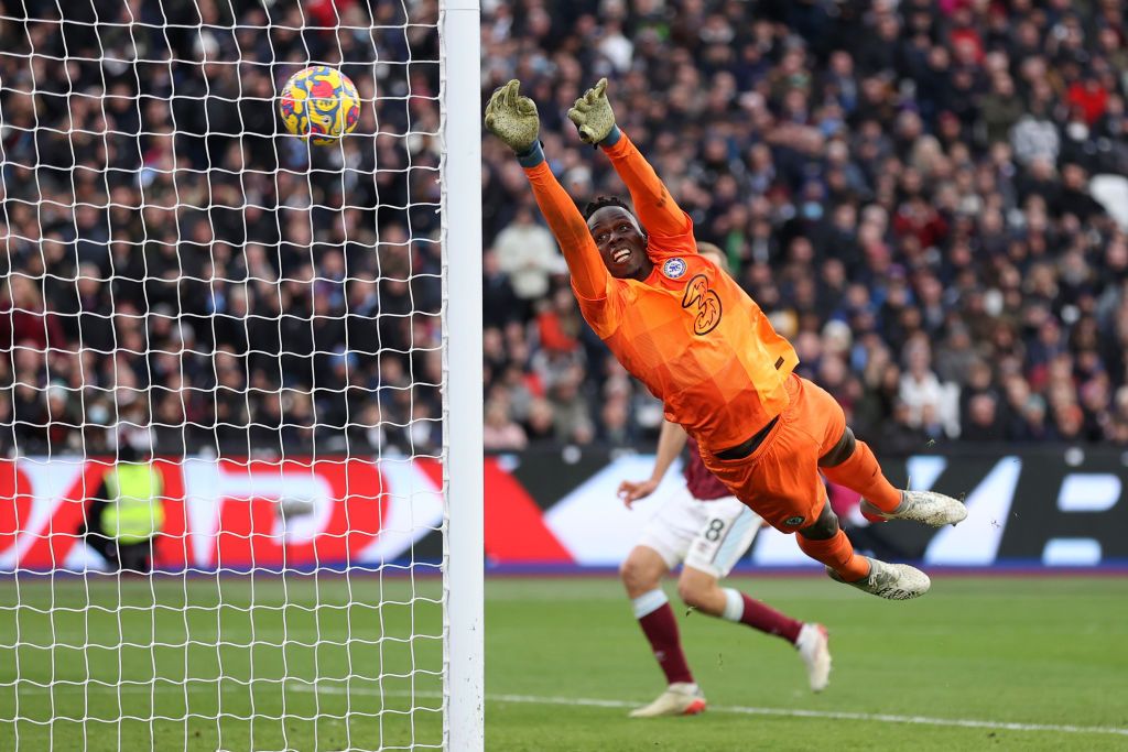LONDON, ENGLAND - DECEMBER 04: Edouard Mendy of Chelsea fails to save a shot from Arthur Masuaku of West Ham United (not pictured), which leads to West Ham United's third goal during the Premier League match between West Ham United and Chelsea at London Stadium on December 04, 2021 in London, England. (Photo by Alex Pantling/Getty Images)