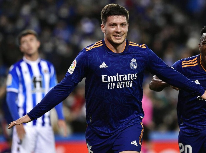 Real Madrid's Luka Jovic celebrates with Vinicius Junior, right, after scoring their side's second goal during the Spanish La Liga soccer match between Real Sociedad and Real Madrid at Reale Arena stadium in San Sebastian, Spain, Saturday, Dec. 4, 2021. (AP Photo/Alvaro Barrientos)