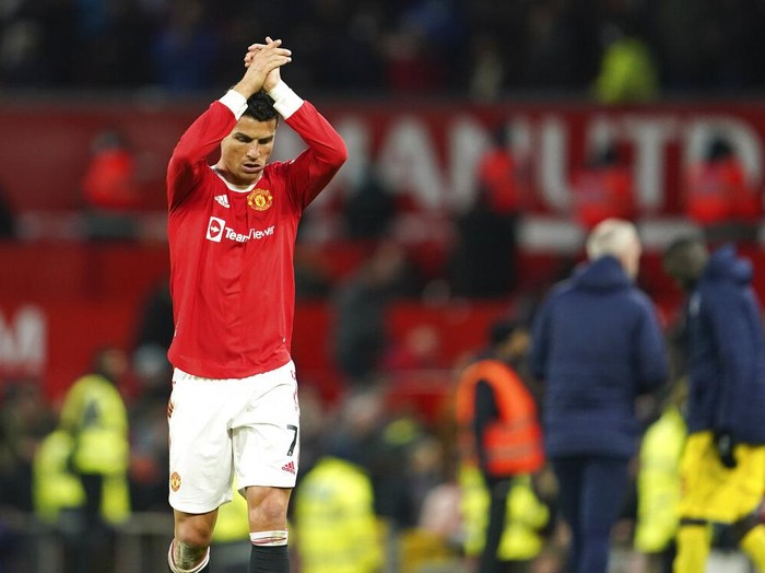 Manchester United's Cristiano Ronaldo reacts at the end of the English Premier League soccer match between Manchester United and Crystal Palace at Old Trafford stadium in Manchester, England, Sunday, Dec. 5, 2021. (AP Photo/Jon Super)