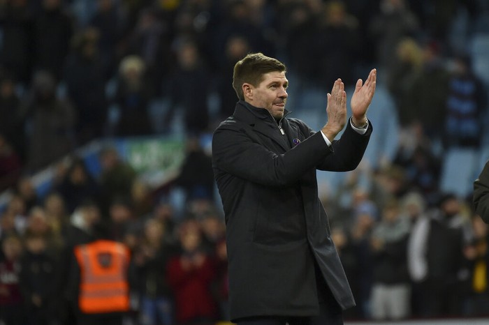 Aston Villas head coach Steven Gerrard applauds players after their win in the English Premier League soccer match between Aston Villa and Leicester City at Villa Park in Birmingham, England, Sunday, Dec. 5, 2021. Aston Villa won the match 2-1. (AP Photo/Rui Vieira)