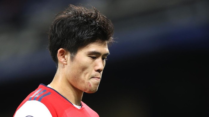 LIVERPOOL, ENGLAND - DECEMBER 06: Takehiro Tomiyasu of Arsenal looks on following the Premier League match between Everton and Arsenal at Goodison Park on December 06, 2021 in Liverpool, England. (Photo by Naomi Baker/Getty Images)