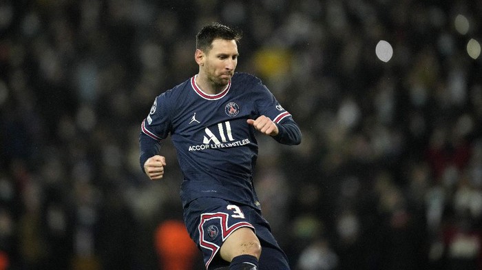 PSGs Lionel Messi celebrates after scoring his sides fourth goal during the Champions League Group A soccer match between PSG and Club Brugge at the Parc des Princes stadium in Paris, France, Tuesday, Dec. 7, 2021. (AP Photo/Christophe Ena)