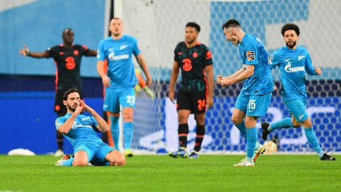 Zenit St. Petersburgs Russian midfielder Magomed Ozdoev celebrates after scoring their third goal during the UEFA Champions League group H football match between Zenit St. Petersburg and Chelsea at the Gazprom Arena stadium in Saint Petersburg on December 8, 2021. (Photo by Olga MALTSEVA / AFP)