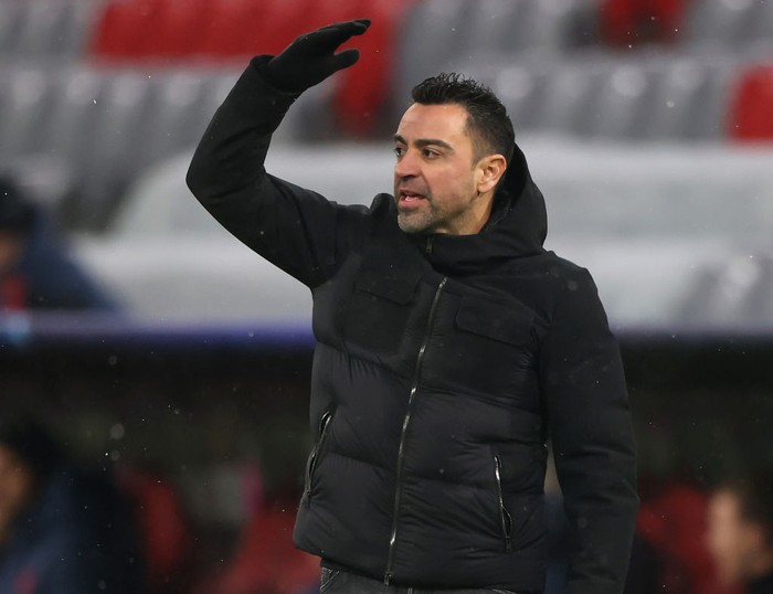 MUNICH, GERMANY - DECEMBER 08: Xavier Hernández i Creus, head coach of Barcelona gestures during the UEFA Champions League group E match between FC Bayern München and FC Barcelona at Football Arena Munich on December 08, 2021 in Munich, Germany. (Photo by Alexander Hassenstein/Getty Images)