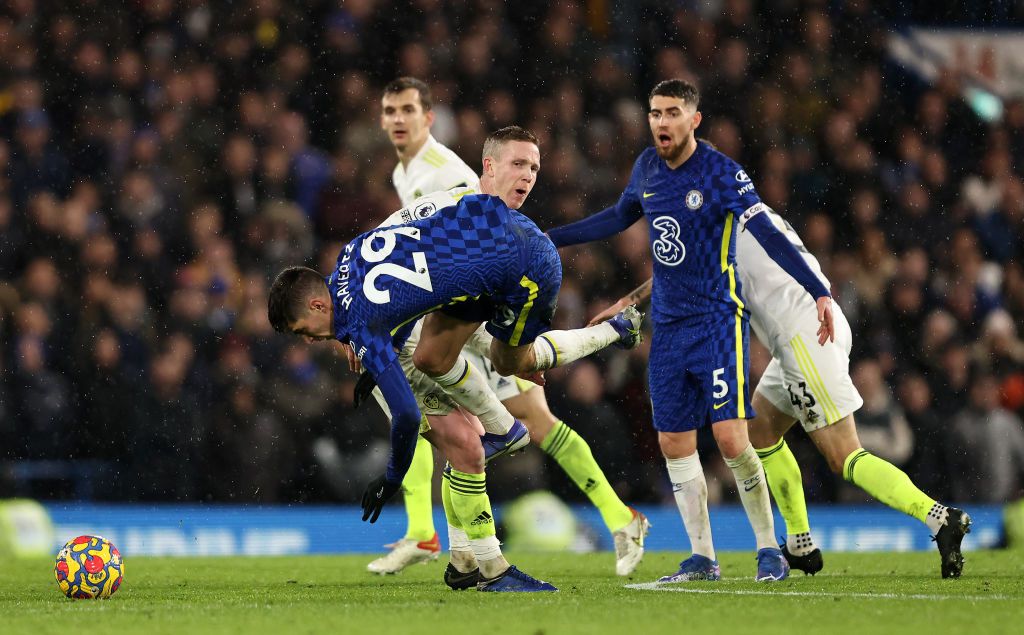 LONDON, ENGLAND - DECEMBER 11: Kai Havertz of Chelsea is fouled by Adam Forshaw of Leeds United during the Premier League match between Chelsea and Leeds United at Stamford Bridge on December 11, 2021 in London, England. (Photo by Marc Atkins/Getty Images)