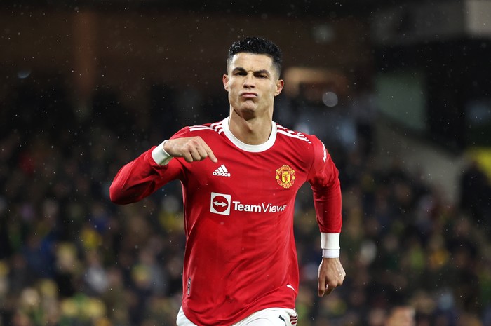 NORWICH, ENGLAND - DECEMBER 11: Cristiano Ronaldo of Manchester United celebrates after scoring his sides first goal from the penalty spot during the Premier League match between Norwich City and Manchester United at Carrow Road on December 11, 2021 in Norwich, England. (Photo by Alex Pantling/Getty Images)