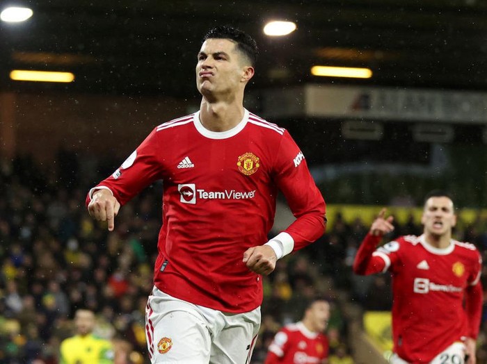 NORWICH, ENGLAND - DECEMBER 11: Cristiano Ronaldo of Manchester United celebrates after scoring their side's first goal during the Premier League match between Norwich City and Manchester United at Carrow Road on December 11, 2021 in Norwich, England. (Photo by Alex Pantling/Getty Images)