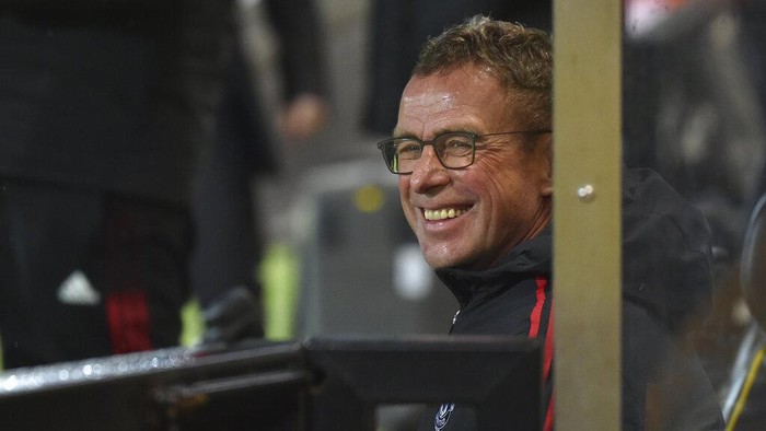 Manchester Uniteds interim coach Ralf Rangnick smiles before the start of the English Premier League soccer match between Norwich City and Manchester United at Carrow road in Norwich, England, Saturday, Dec.11, 2021. (AP Photo/Rui Vieira)