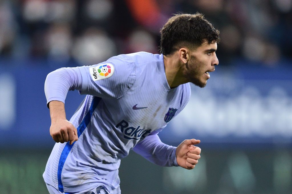 PAMPLONA, SPAIN - DECEMBER 12: Abde Ezzalzouli of FC Barcelona celebrates after scoring their sides second goal during the La Liga Santander match between CA Osasuna and FC Barcelona at Estadio El Sadar on December 12, 2021 in Pamplona, Spain. (Photo by Juan Manuel Serrano Arce/Getty Images)