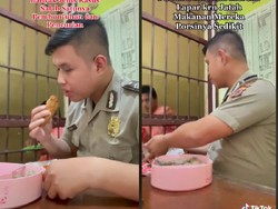 Aksi Polisi Berbagi Makanan ke Tahanan Penjara Ini Bikin Terharu