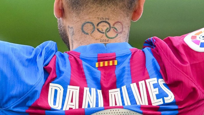 BARCELONA, SPAIN - NOVEMBER 17: A tattoo of the Olympic ring is seen on Dani Alves as he is presented as a FC Barcelona player at Camp Nou on November 17, 2021 in Barcelona, Spain. (Photo by David Ramos/Getty Images)