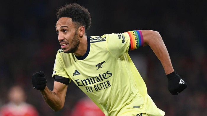 MANCHESTER, ENGLAND - DECEMBER 02:  Pierre-Emerick Aubameyang of Arsenal wears an armband to show support for the Rainbow Laces campaign during the Premier League match between Manchester United  and  Arsenal at Old Trafford on December 02, 2021 in Manchester, England. (Photo by Shaun Botterill/Getty Images)