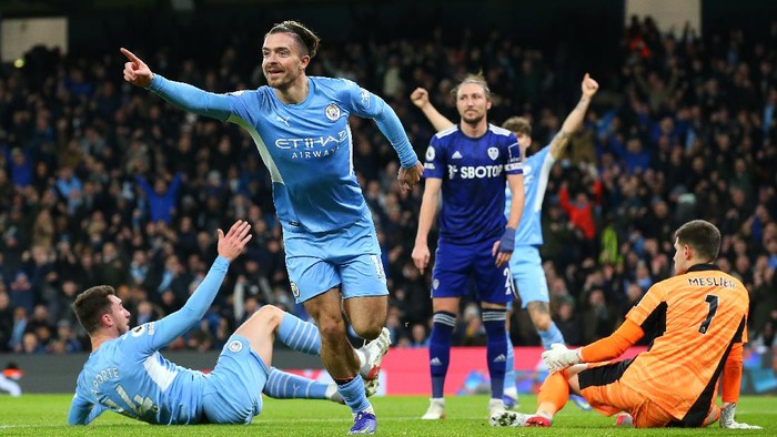 MANCHESTER, ENGLAND - DECEMBER 14: Jack Grealish of Manchester City celebrates after scoring their sides second goal during the Premier League match between Manchester City and Leeds United at Etihad Stadium on December 14, 2021 in Manchester, England. (Photo by Alex Livesey/Getty Images)