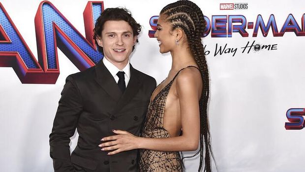 Tom Holland, left, and Zendaya arrive at the premiere of 