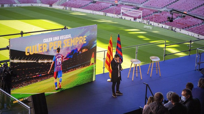 Barcelona striker Sergio Aguero speaks during a press conference at the Camp Nou stadium in Barcelona, Spain, Wednesday, Dec. 15, 2021. Sergio Aguero has announced his retirement from football on Wednesday due to a heart condition. (AP Photo/Emilio Morenatti)