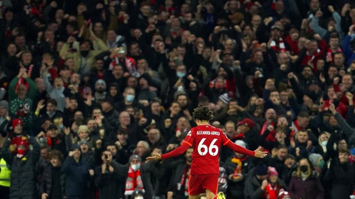 Liverpools Trent Alexander-Arnold celebrates after scoring his sides third goal during the English Premier League soccer match between Liverpool and Newcastle United at Anfield stadium in Liverpool, England, Thursday, Dec. 16, 2021. (AP Photo/Jon Super)