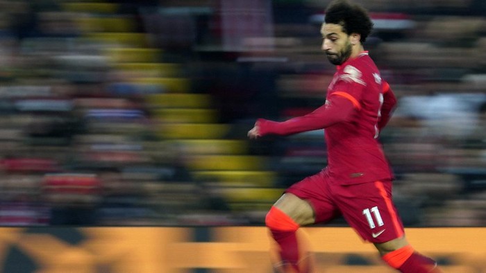 Liverpools Mohamed Salah controls the ball during the English Premier League soccer match between Liverpool and Newcastle United at Anfield stadium in Liverpool, England, Thursday, Dec. 16, 2021. (AP Photo/Jon Super)
