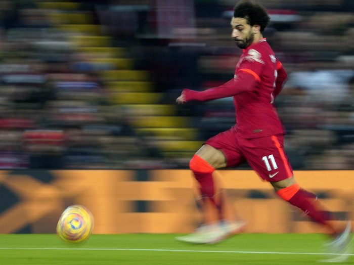 Liverpool's Mohamed Salah controls the ball during the English Premier League soccer match between Liverpool and Newcastle United at Anfield stadium in Liverpool, England, Thursday, Dec. 16, 2021. (AP Photo/Jon Super)