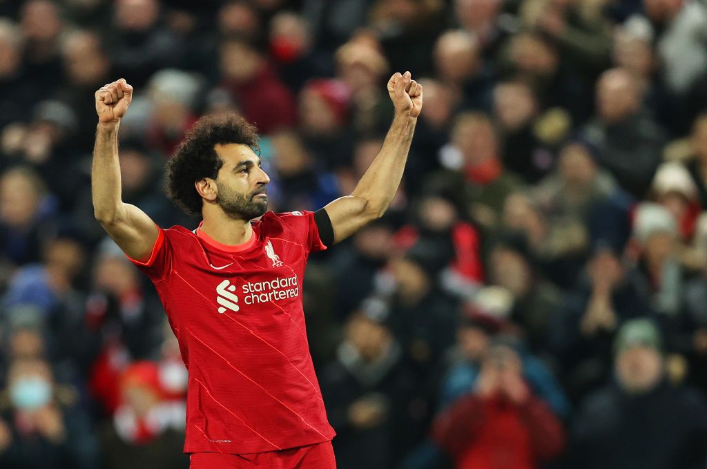 LIVERPOOL, ENGLAND - DECEMBER 11: Mohamed Salah of Liverpool celebrates after scoring their side's first goal from the penalty spot during the Premier League match between Liverpool and Aston Villa at Anfield on December 11, 2021 in Liverpool, England. (Photo by Clive Brunskill/Getty Images)
