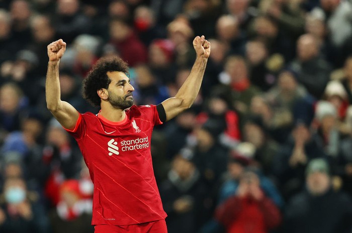 LIVERPOOL, ENGLAND - DECEMBER 11: Mohamed Salah of Liverpool celebrates after scoring their sides first goal from the penalty spot during the Premier League match between Liverpool and Aston Villa at Anfield on December 11, 2021 in Liverpool, England. (Photo by Clive Brunskill/Getty Images)