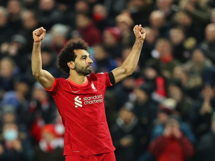 LIVERPOOL, ENGLAND - DECEMBER 11: Mohamed Salah of Liverpool celebrates after scoring their side's first goal from the penalty spot during the Premier League match between Liverpool and Aston Villa at Anfield on December 11, 2021 in Liverpool, England. (Photo by Clive Brunskill/Getty Images)