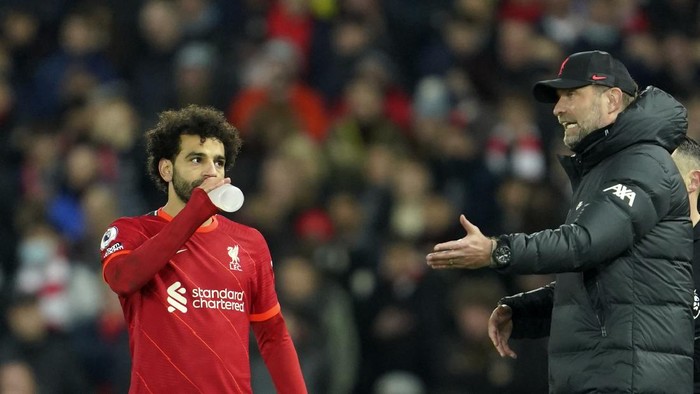 Juergen Klopp Liverpools manager Jurgen Klopp, right, gives instructions to Liverpools Mohamed Salah during the English Premier League soccer match between Liverpool and Newcastle United at Anfield stadium in Liverpool, England, Thursday, Dec. 16, 2021. (AP Photo/Jon Super)