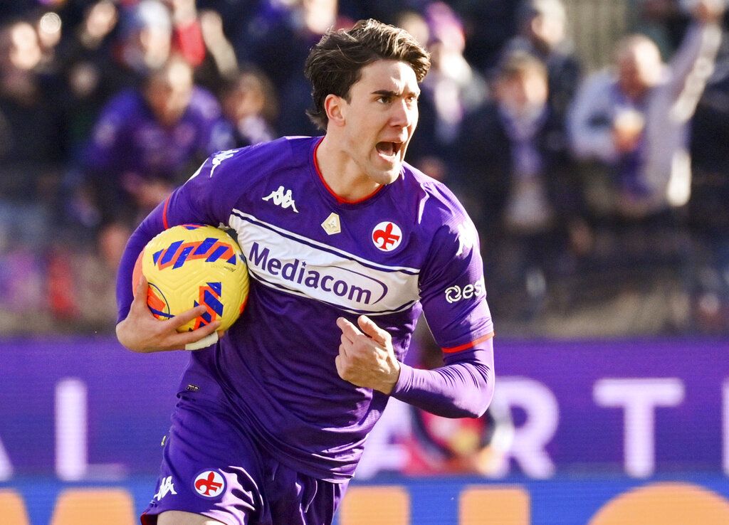 Fiorentina's Dusan Vlahovic celebrates scoring during a Serie A soccer match between Fiorentina and Sassuolo at Artemio Franchi stadium in Florence, Italy, Sunday Dec. 19, 2021. (Massimo Paolone/LaPresse via AP)