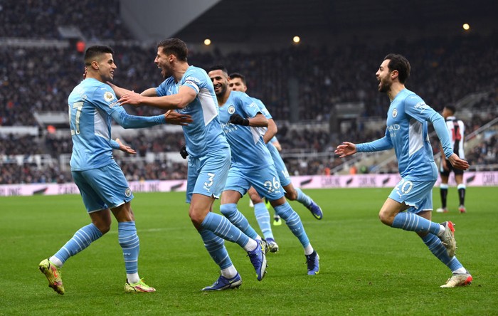 NEWCASTLE UPON TYNE, ENGLAND - DECEMBER 19: Manchester City player Ruben Dias (#3) celebrates after scoring the first City goal during the Premier League match between Newcastle United  and  Manchester City at St. James Park on December 19, 2021 in Newcastle upon Tyne, England. (Photo by Stu Forster/Getty Images)